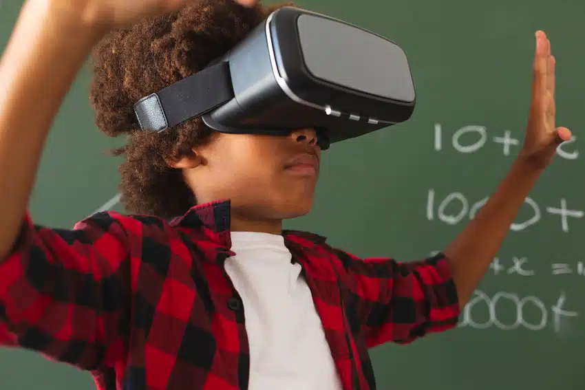 Male student using VR in a class.