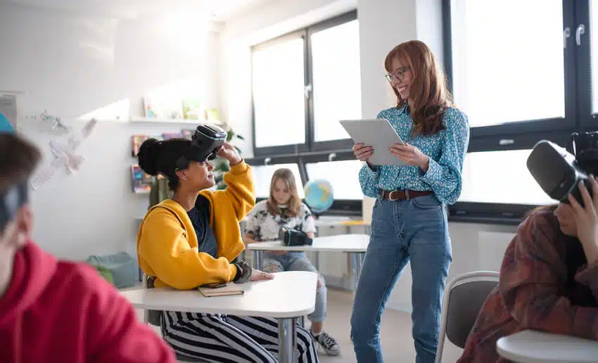 High school students using VR in a class.