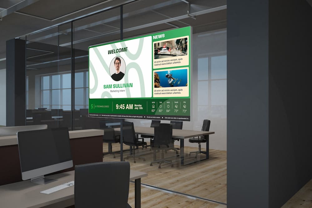 A digital signage screen inside the office.