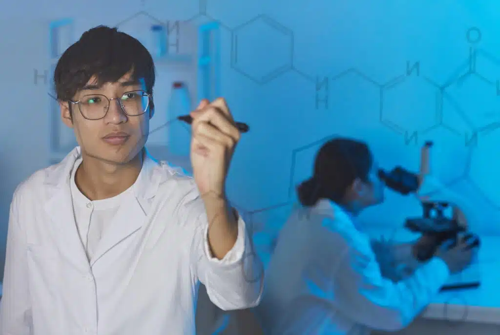 A boy writing in an eGlass board