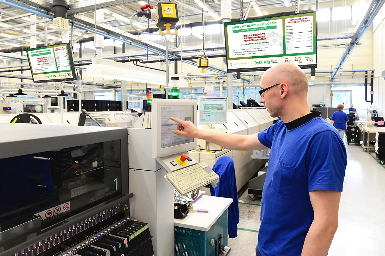 A man using a digital signage as a communication tool