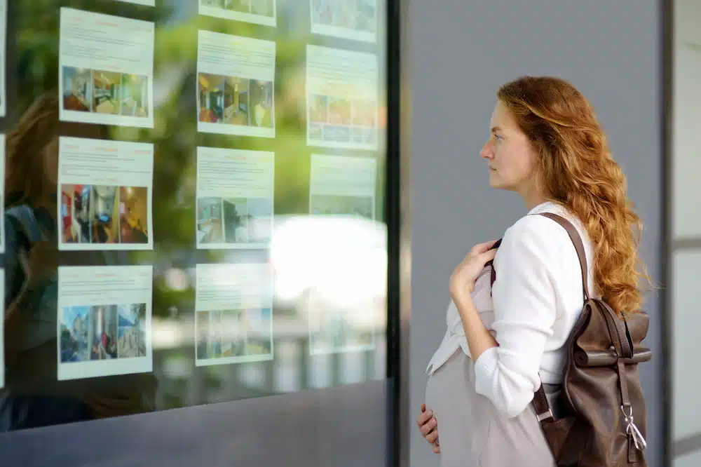 woman looking at interactive digital signage in buffalo new york