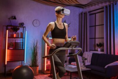 Augmented reality solutions in Columbus | woman in treadmill wearing vr headset  