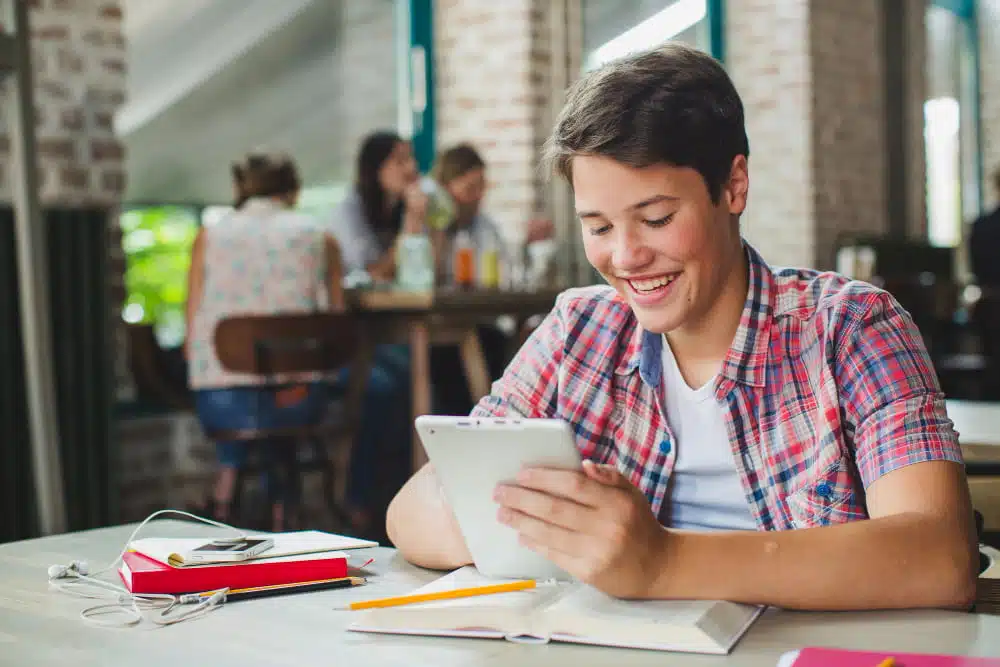 student using tablet for school